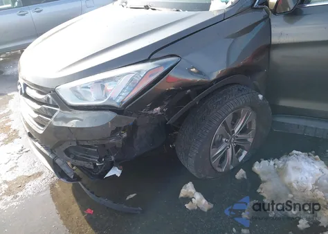 2014 Hyundai Santa Fe Sport 2.4L z USA, uszkodzony, nr VIN 5XYZUDLB5EG136383